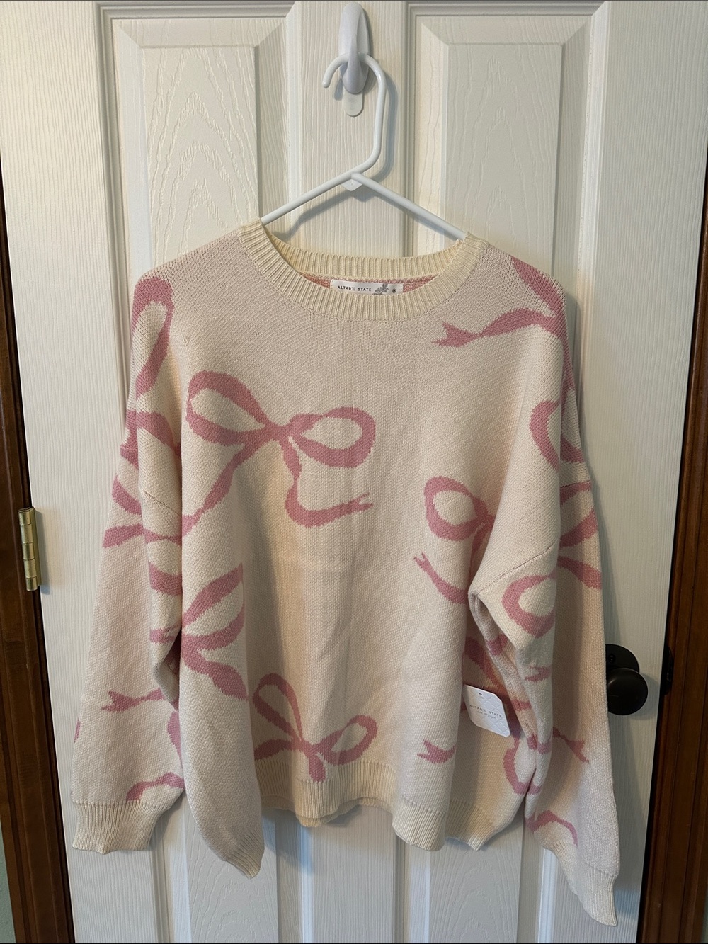 Altar'd State Cream Sweater with Pink Bow Motif